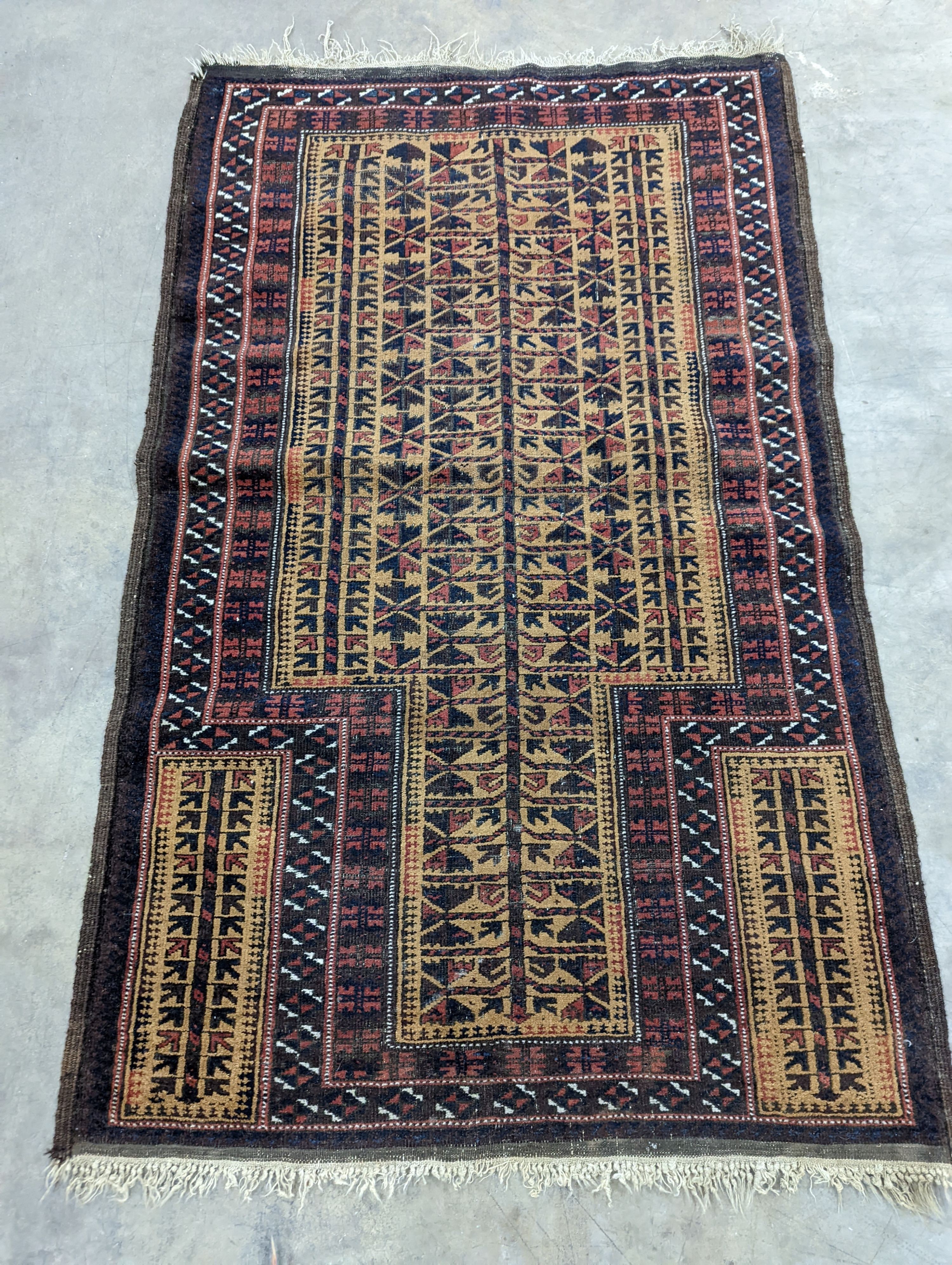 A Belouch geometric prayer rug and two Caucasian design rugs, largest 152 x 104cm